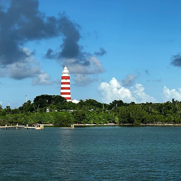 The candy-striped Hope Town lighthouse on Elbow Cay, seen from Hope Town Harbour