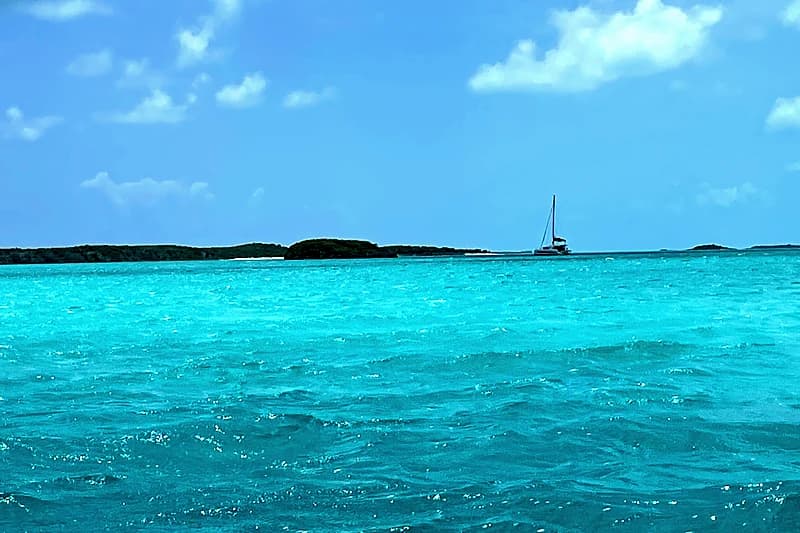 Crossing the Exuma Bank under sail — flat water and a following breeze